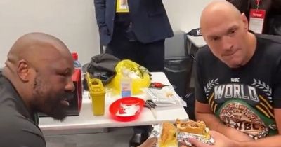 Tyson Fury and Derek Chisora tuck into Five Guys burgers after the "war is complete"