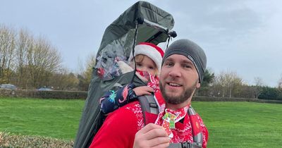 Dad runs 30 miles - with his daughter strapped to his back