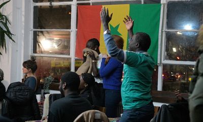In a London restaurant, Senegalese hold heads high despite England disappointment