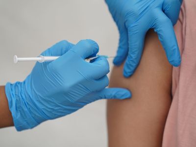 Covid boosters urged as hundreds of thousands at risk yet to get jab