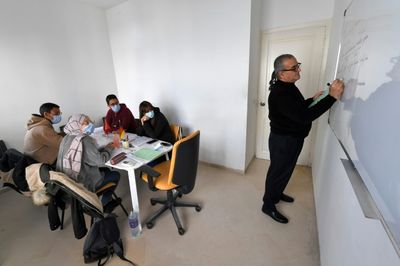 Tunisians dream of moving to Germany as crisis bites