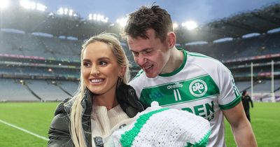 TJ Reid celebrates Ballyhale's Leinster win with newborn baby and wife Niamh De Brun on Croke Park pitch