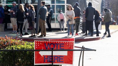 Georgia returns to the polls in tiebreaker midterms vote for US Senate seat