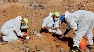 Libya Identifies 12 Bodies Buried in Mass Graves