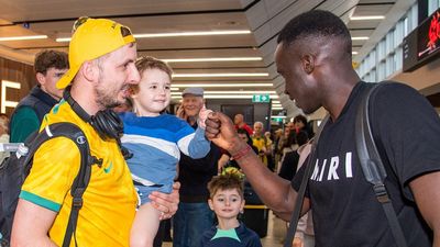 Socceroos players return to Australia after inspiring FIFA World Cup campaign
