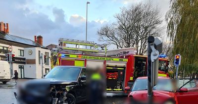 Car smashes into Dublin traffic lights with two people rushed to hospital