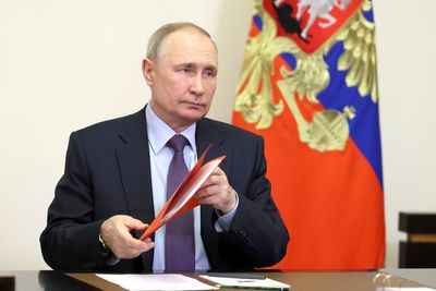 Putin signs law expanding Russia's rules against 'LGBT propaganda'