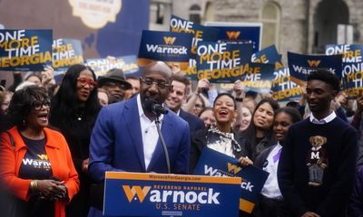 Democrat Raphael Warnock holds narrow poll lead in crucial Georgia Senate runoff – as it happened