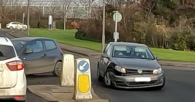 Watch heart-stopping Edinburgh moment two cars crash on busy roundabout