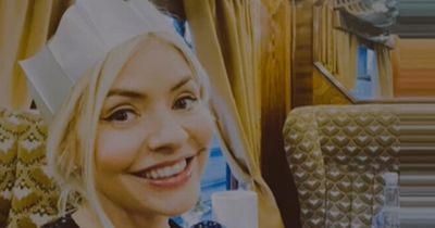 Holly Willoughby toasts with fizz as she enjoys luxury Christmas trip with famous pals