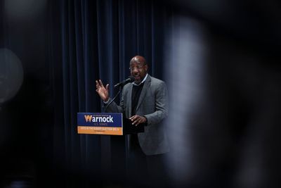 Georgia runoff election - live: Incumbent Warnock rides ahead of Walker in closely divided state