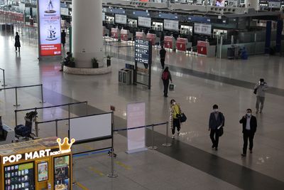 Beijing Capital Airport drops negative COVID test requirement from Tuesday