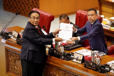 Indonesia passes new criminal code, outlaws sex outside marriage