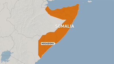 Somali parliament moves session, gunfire heard at besieged hotel