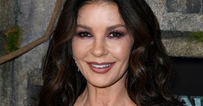 Catherine Zeta Jones wears plunging mesh gown as she takes handsome son Dylan to premiere