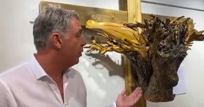 Gobsmacked artist finds face of Jesus on his 'crucified tree' sculpture