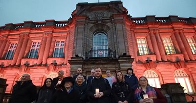 Hamilton Town House lit up to mark a campaign against gender-based violence
