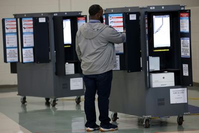 Polls close in Georgia runoff Senate vote, a new test for Biden