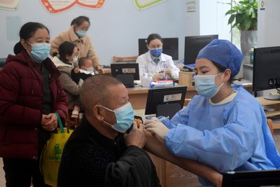 China to optimise epidemic prevention and control next year -state media