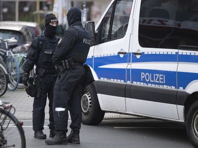 Across Germany, 25 are arrested on suspicion of planning an armed coup, officials say