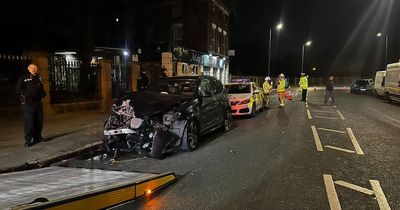 BMW crashes into pub as drinkers evacuated and roads closed