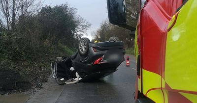 Ireland weather: Drivers warned of 'treacherous conditions' after car flips on roof during morning commute