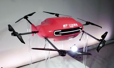 Japan Post unveils drones for deliveries