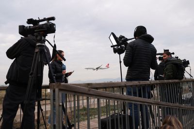 Migrants flee plane after forcing emergency landing in Barcelona