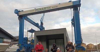 Protesters block installation of floating hotel pods at Penarth Marina