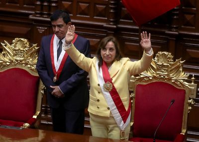 Dina Boluarte, Peru's first female president, pledges to heal nation's wounds