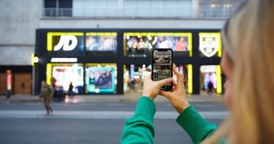 Store front is turned into giant AR arcade machine for Christmas