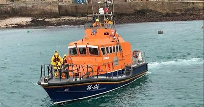 Huge search and rescue operation for three people missing after boat sinks off UK coast