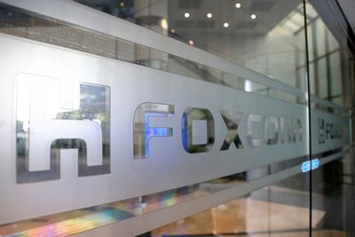 Apple supplier Foxconn's founder pushed China to ease COVID curbs - WSJ