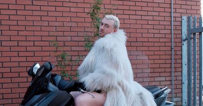 Sam Smith shocks and delights fans with saucy near-naked motorcycle straddle picture