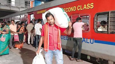 Lecturer moonlights as porter to help poor kids