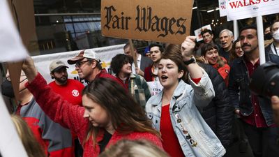 New York Times journalists, other employees on strike for first time in decades