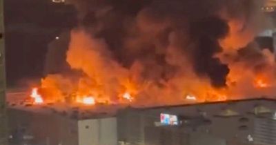 Moscow fire: Huge blaze at shopping centre with explosions heard and one dead