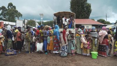 Fleeing DR Congo, thousands of Congolese refugees stream into Uganda