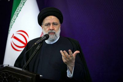 Iran's Raisi promises to pursue crackdown on protesters; cleric critical of execution