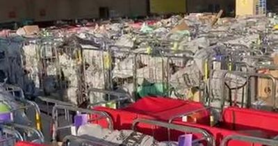 Hundreds of packages pile up outside Warrington Royal Mail centre as posties strike