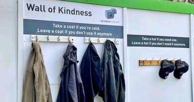 Heartwarming 'wall of kindness' offers free coats and hats to those struggling in cold