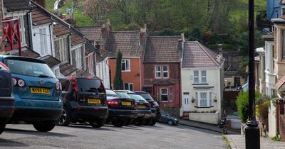 Brits on country's steepest street have to tie cars to lamp posts and even SKI down it