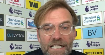 Fuming Jurgen Klopp told reporter to 'stop the interview' as Liverpool defender pulled away from referee after controversial derby