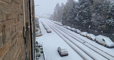 Edinburgh residents wake up to snow as Met Office weather warning brought forward