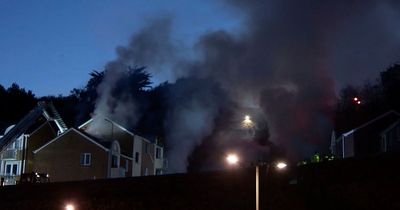 One person dead and 12 missing after huge explosion rocks block of flats