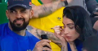 World Cup fans in stands steal the show as man appears to get 'busted' live on air