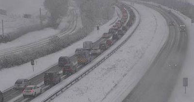 Drivers stuck in the snow as wintry weather brings major road to a standstill