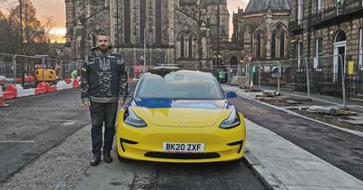 Scottish man is living in his Tesla in Edinburgh to protest the Ukraine war