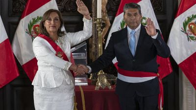 Peru's president swears in cabinet as pro-Castillo supporters clash with police