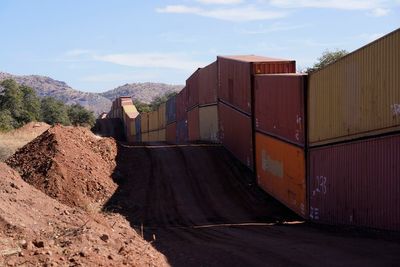 Arizona Gov. Ducey stacks containers on border at term's end